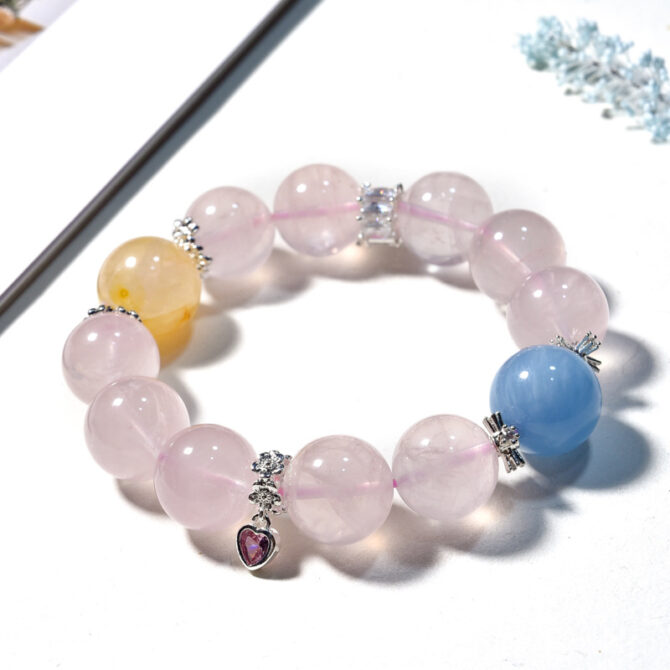 Natural Rose Quartz Bead Bracelet. The beads maintain their color, and it is a crystal bracelet that is believed to attract romantic luck.15MM - Image 2
