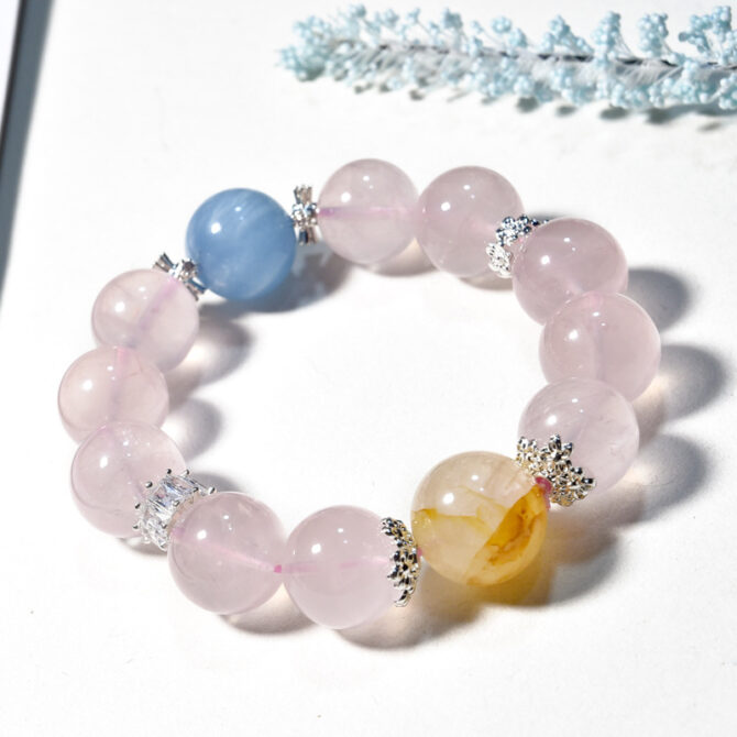 Natural Rose Quartz Bead Bracelet. The beads maintain their color, and it is a crystal bracelet that is believed to attract romantic luck.15MM